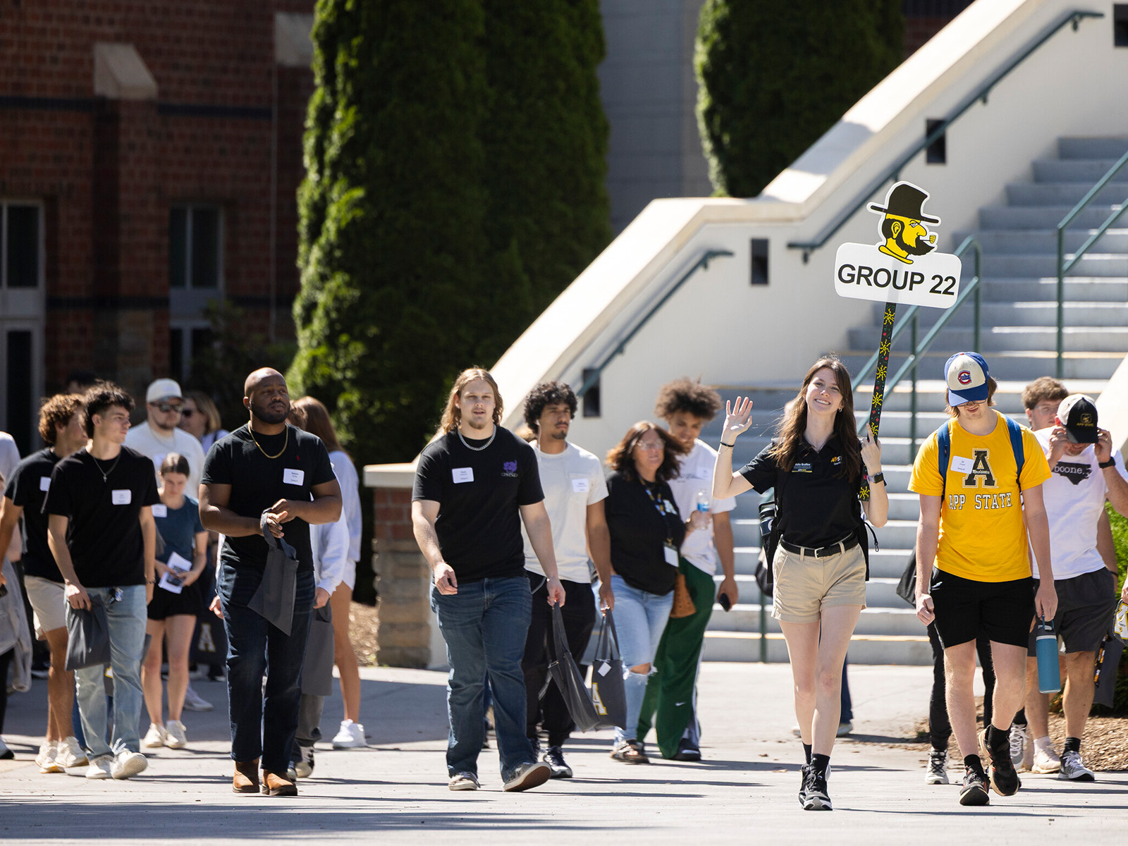 A group of students being lead by an orientation leader
